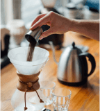 A delicious cup of coffee beans in a bustling coffee shop